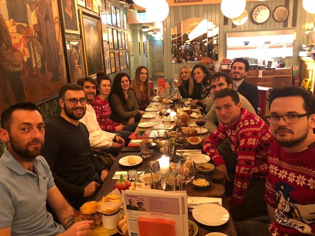 a group of people at a christmas table
