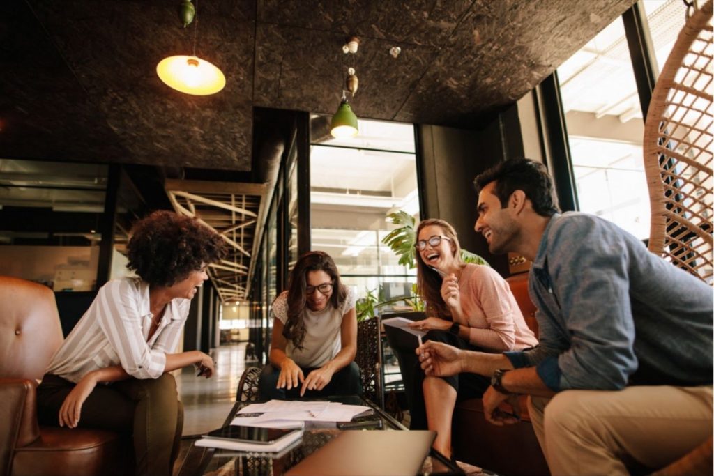A group of people discussing coliving ideas