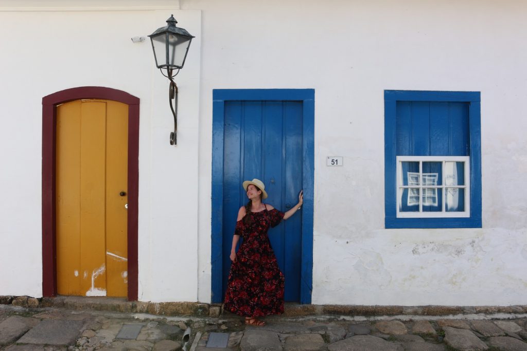Iva walking through a town