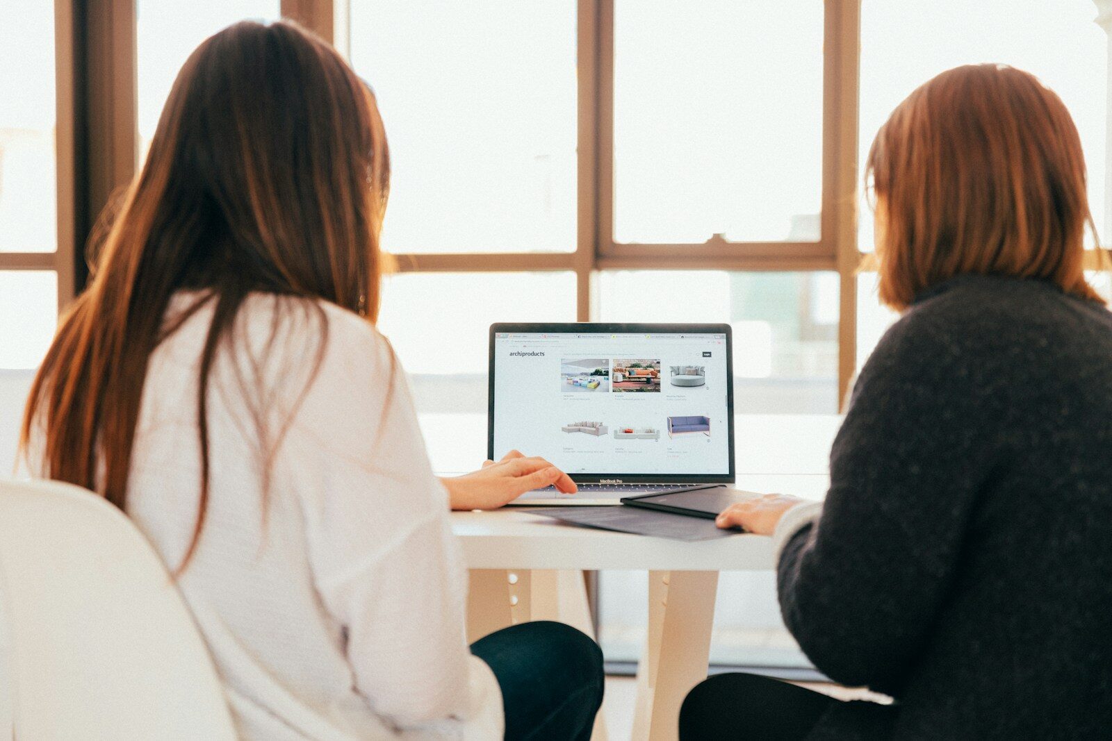 Healthcare professionals and researchers working remotely with laptop and high-speed Wi-Fi